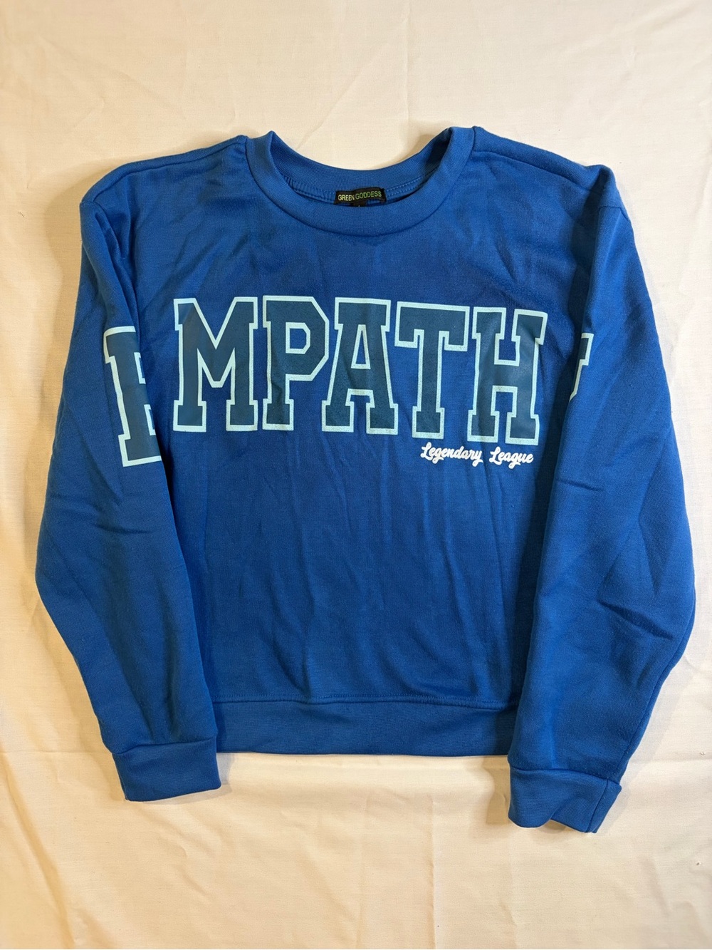 Unk Blue Crewneck Sweater with EMPATHY Lettering